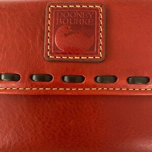 Beautiful Dooney Florentine Continental Cluth